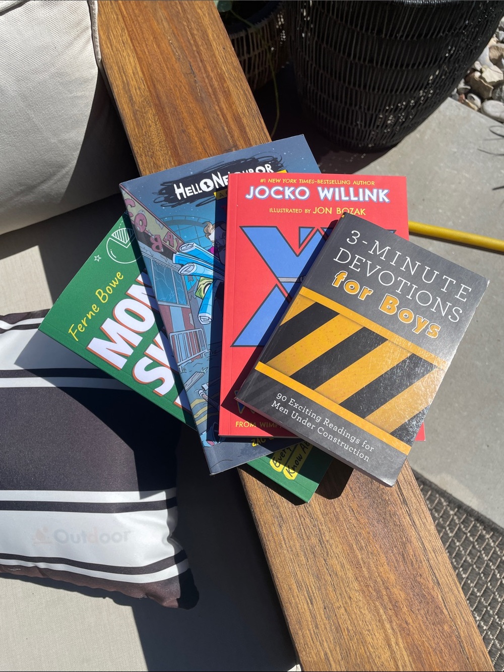 Stack of Colorful Kids Books - Yellow, Red, Green, Blue, Black Covers